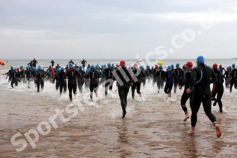 Start of the Bamburgh Triathlon with Bamburgh Castle